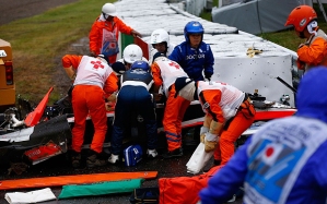 F1 Grand Prix of Japan...SUZUKA, JAPAN - OCTOBER 05:  Jules Bianchi of France and Marussia receives urgent medical treatment after crashing during the Japanese Formula One Grand Prix at Suzuka Circuit on October 5, 2014 in Suzuka, Japan.  (Photo by Getty Images/Getty Images)